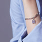 BTS-Inspired Signature Charm Bracelet – Elegant Silver Finish with Premium Purple Stone Accents