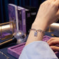 BTS-Inspired Signature Charm Bracelet – Elegant Silver Finish with Premium Purple Stone Accents